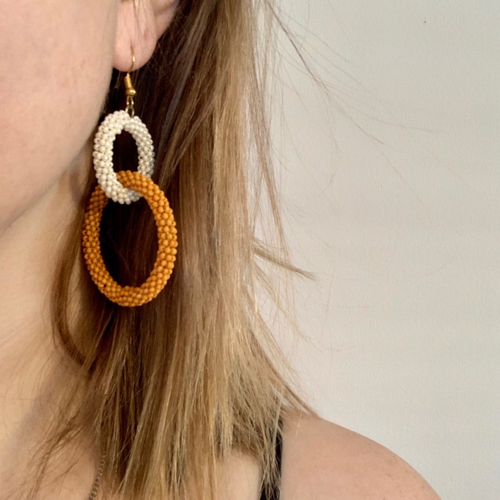 American Eagle orange & white beaded hoop earrings